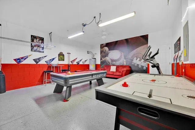 a reading room with furniture and screen