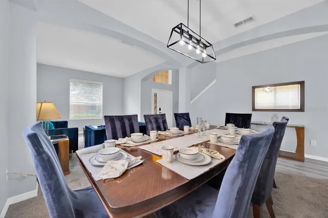 a view of a dining room with furniture