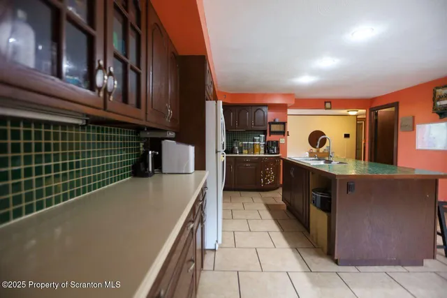 a room with furniture and flat screen tv