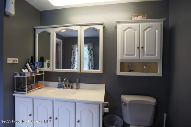 a kitchen that has a sink and a stove