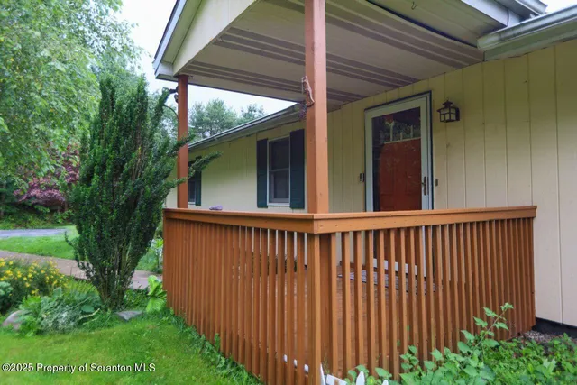 an aerial view of a house with garden