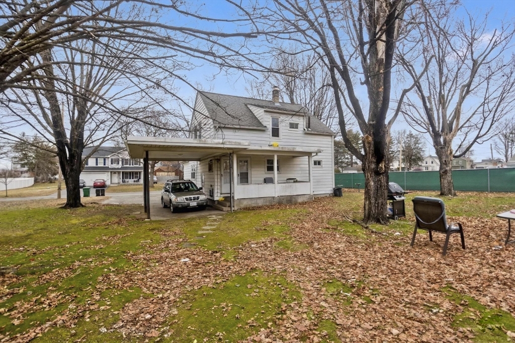 177 Marion Street Chicopee, MA 01013 - Photo 6 of 36 a view of a house with backyard porch and sitting area