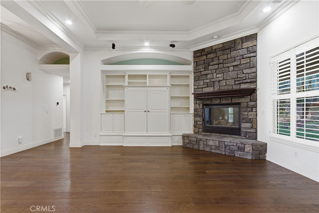 2144 King Arthur Court Merced, CA 95340 - Photo 12 of 66 a view of fireplace and wooden floor