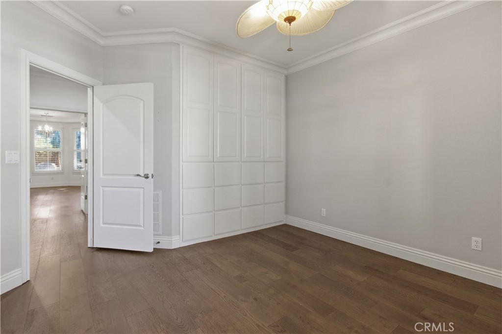 2144 King Arthur Court Merced, CA 95340 - Photo 27 of 66 wooden floor in an empty room with a window