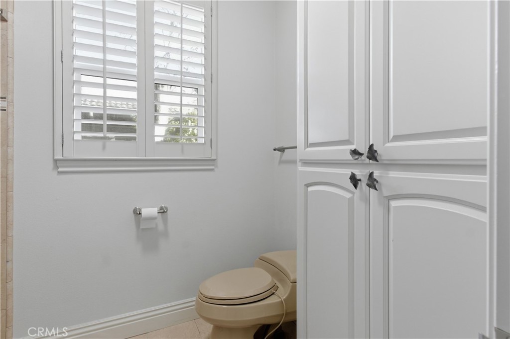 2144 King Arthur Court Merced, CA 95340 - Photo 29 of 66 a bathroom with a toilet and a shower