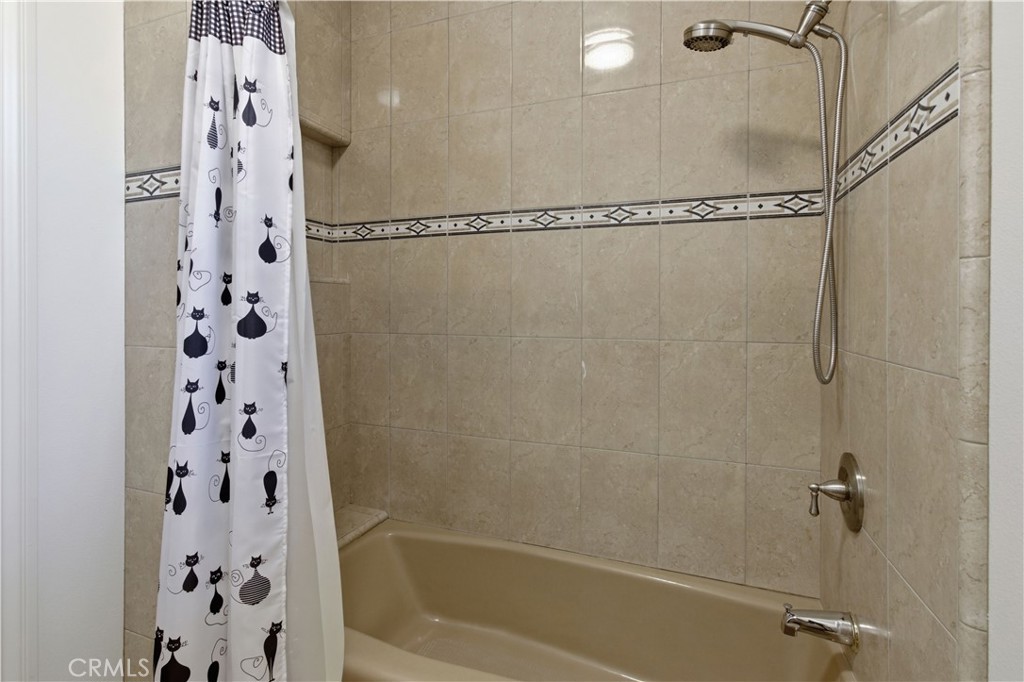 2144 King Arthur Court Merced, CA 95340 - Photo 30 of 66 a bathroom with a bathtub and shower