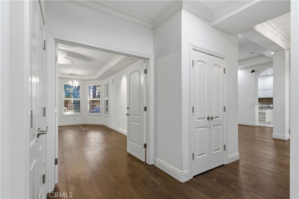 2144 King Arthur Court Merced, CA 95340 - Photo 34 of 66 a view of an empty room with wooden floor and a bathroom