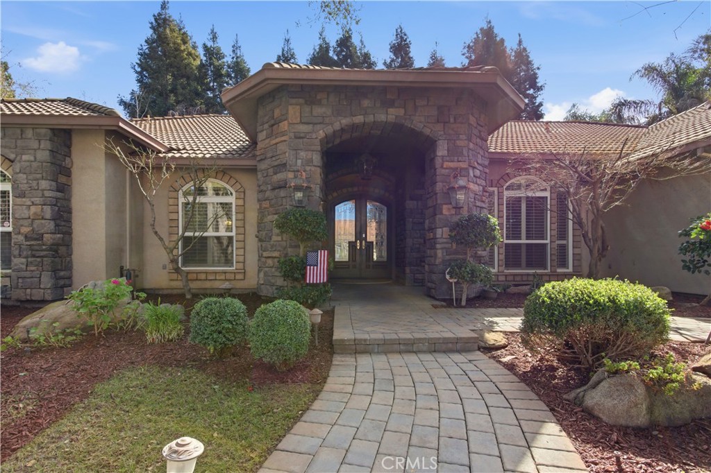 2144 King Arthur Court Merced, CA 95340 - Photo 4 of 66 a front view of a house