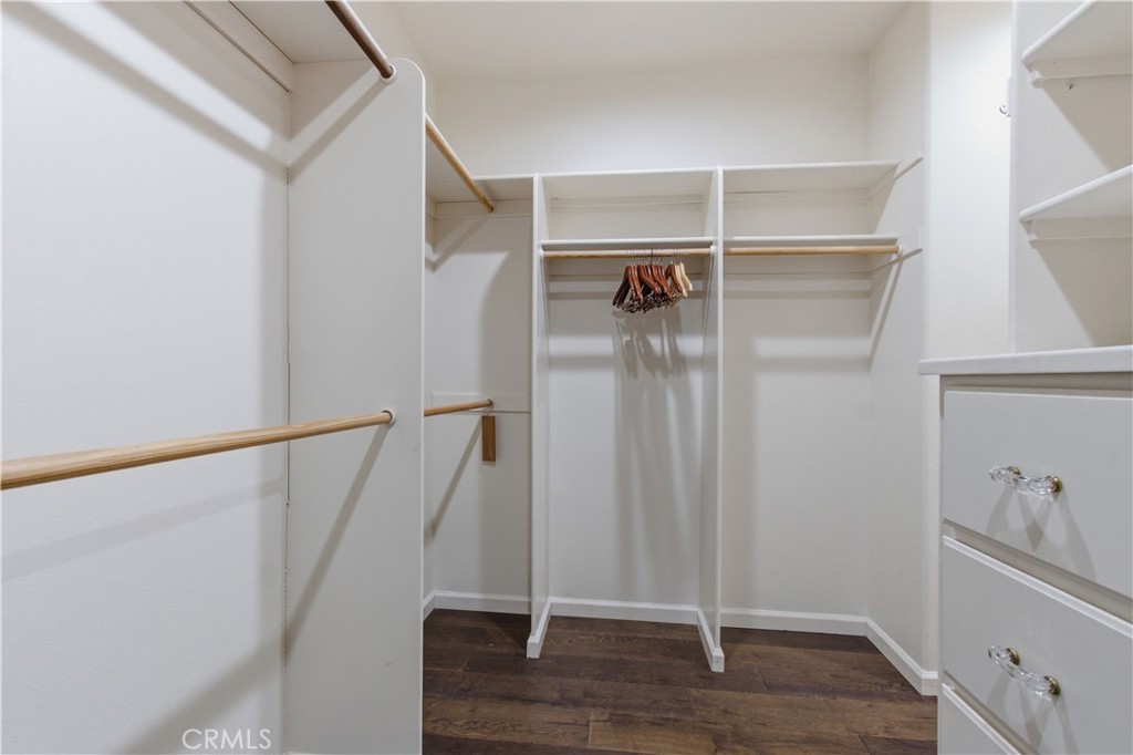 2144 King Arthur Court Merced, CA 95340 - Photo 41 of 66 a view of walk in closet with empty racks