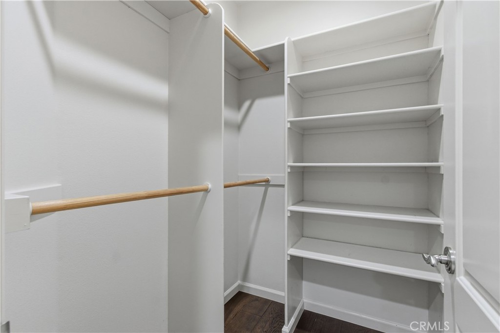 2144 King Arthur Court Merced, CA 95340 - Photo 42 of 66 a view of walk in closet with empty racks
