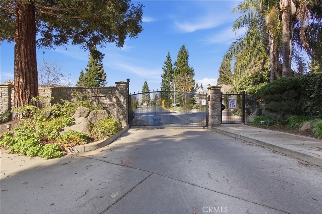 2144 King Arthur Court Merced, CA 95340 - Photo 62 of 66 a view of a street with a trees in the background