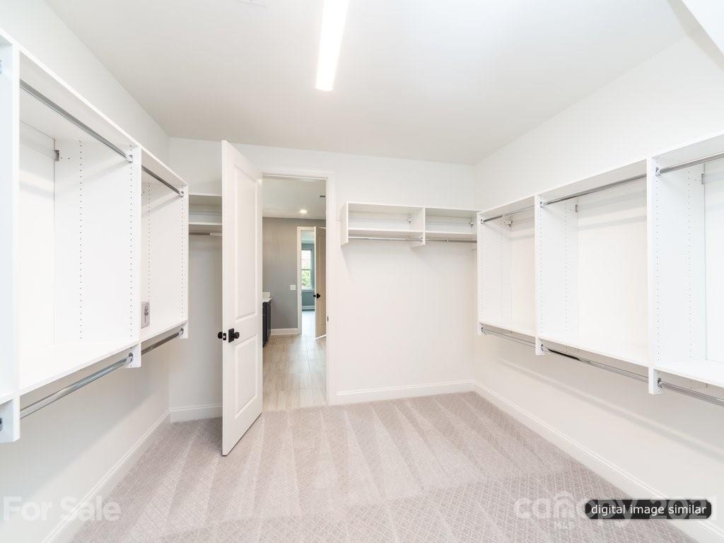 12031 Huntson Reserve Road Huntersville, NC 28078 - Photo 14 of 23 a view of an empty room with a closet