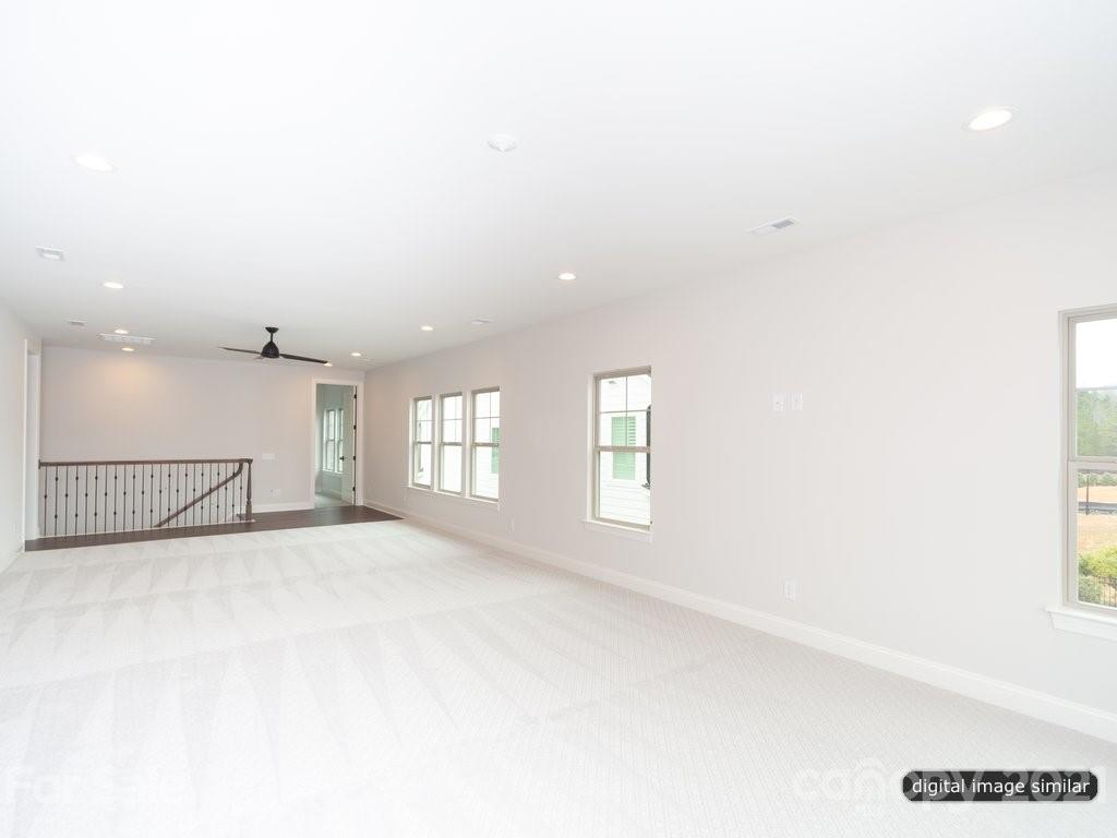 12031 Huntson Reserve Road Huntersville, NC 28078 - Photo 15 of 23 a view of an empty room with a window