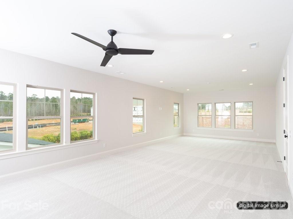 12031 Huntson Reserve Road Huntersville, NC 28078 - Photo 16 of 23 a view of an empty room with a window