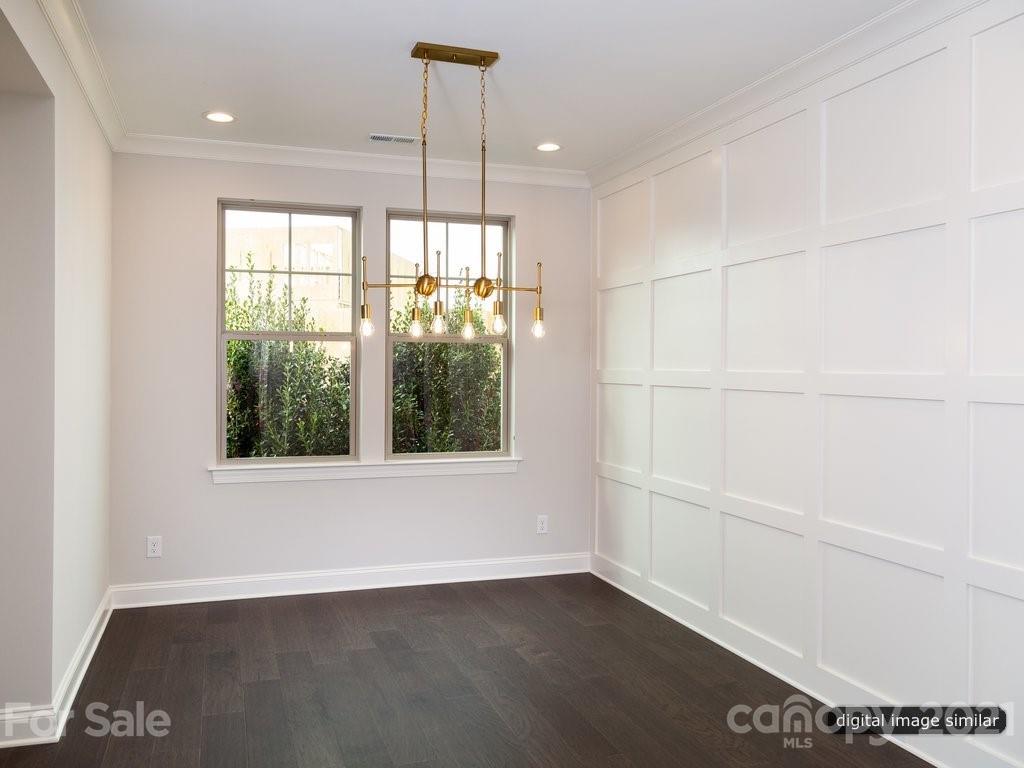 12031 Huntson Reserve Road Huntersville, NC 28078 - Photo 17 of 23 an empty room with wooden floor and windows