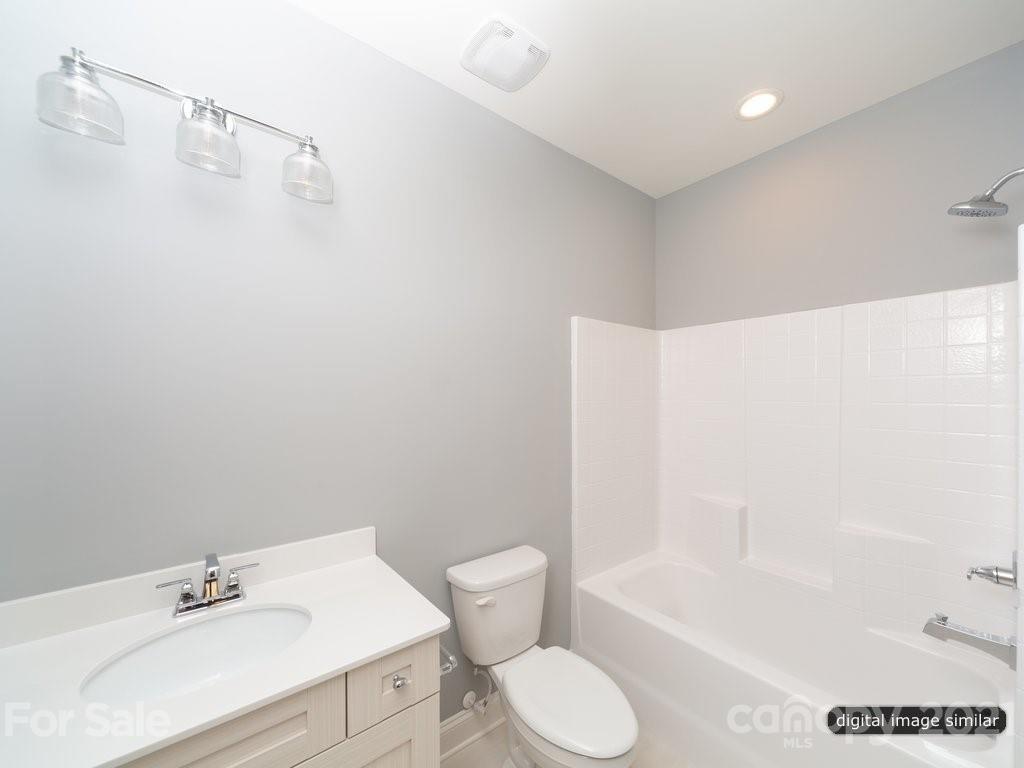 12031 Huntson Reserve Road Huntersville, NC 28078 - Photo 20 of 23 a bathroom with a sink toilet and shower