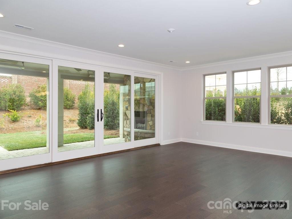 12031 Huntson Reserve Road Huntersville, NC 28078 - Photo 8 of 23 a view of room with window and floor to ceiling window
