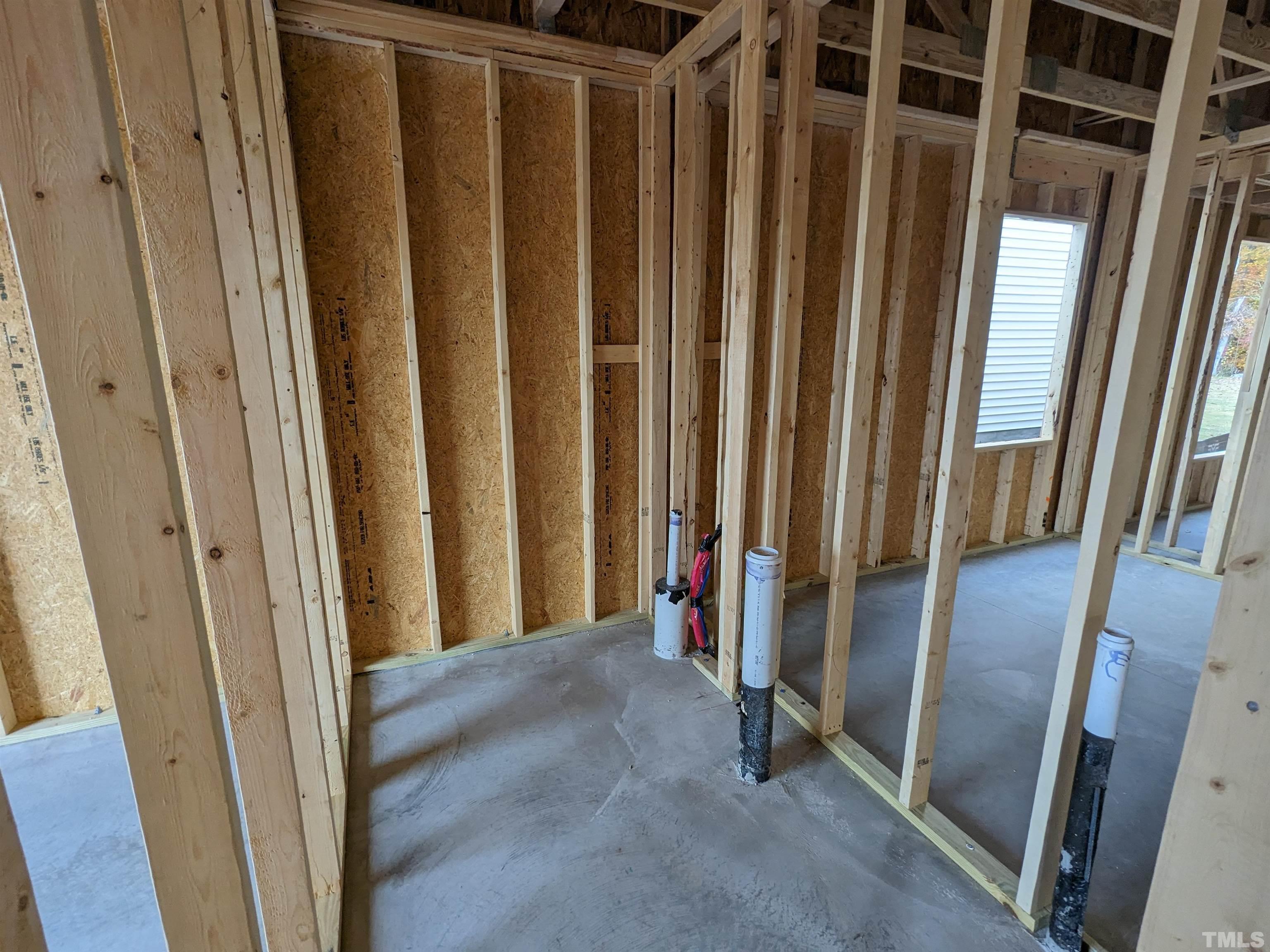 291 Ford Meadows Drive Garner, NC 27529 - Photo 3 of 13 a view of a closet with wooden floor