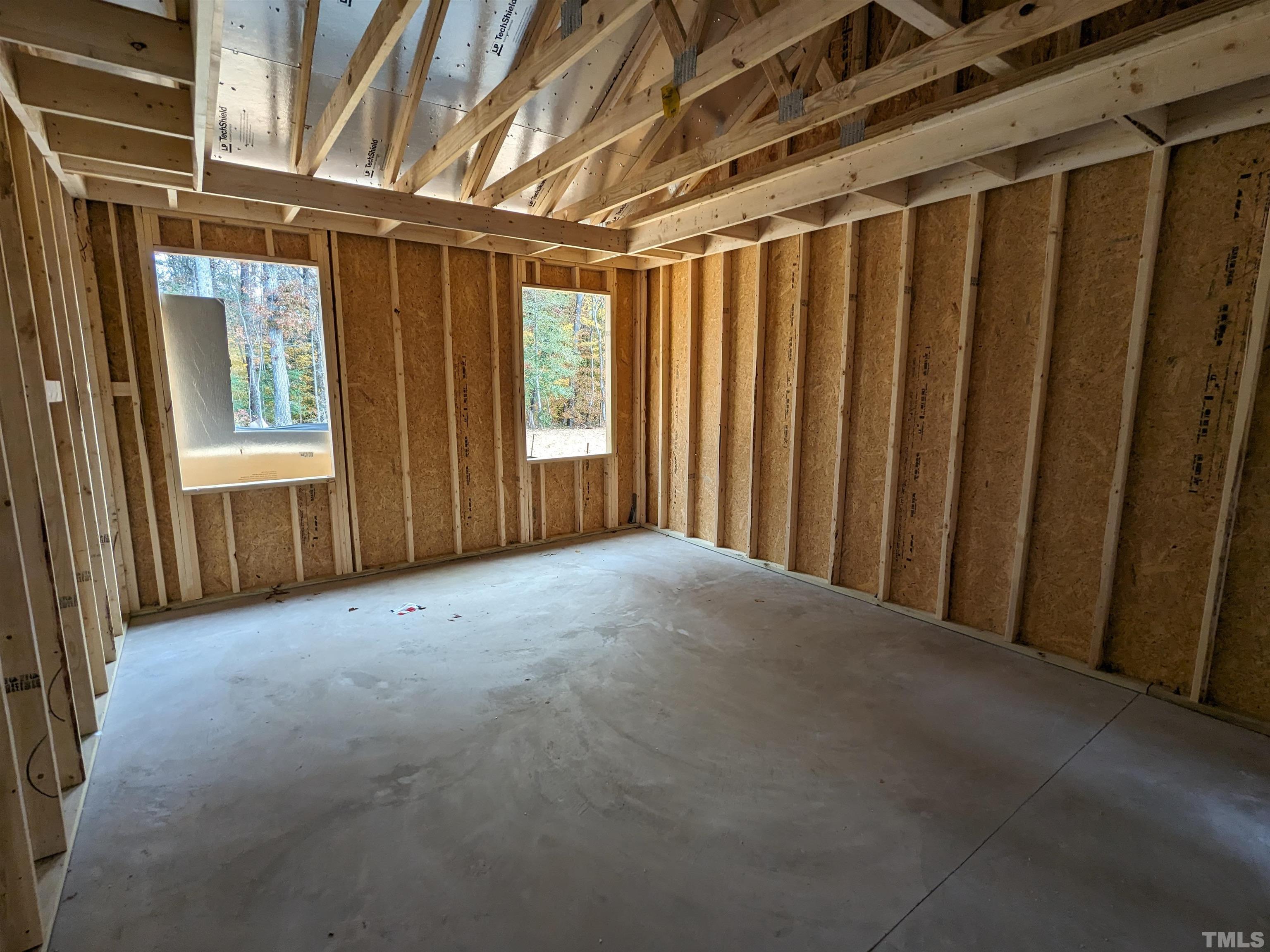 291 Ford Meadows Drive Garner, NC 27529 - Photo 9 of 13 a view of an empty room with a window
