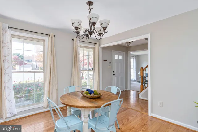 a kitchen with wooden cabinets and stainless steel appliances