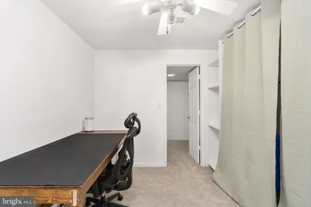 a view of a house with a yard and garage