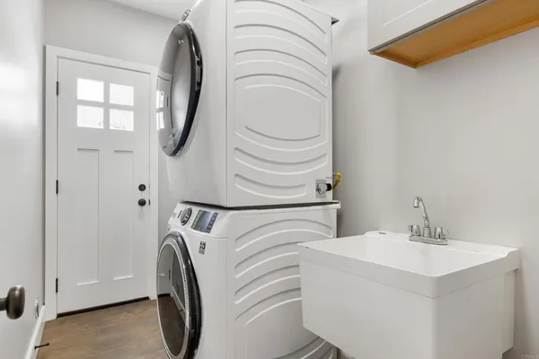 a utility room with dryer and washer