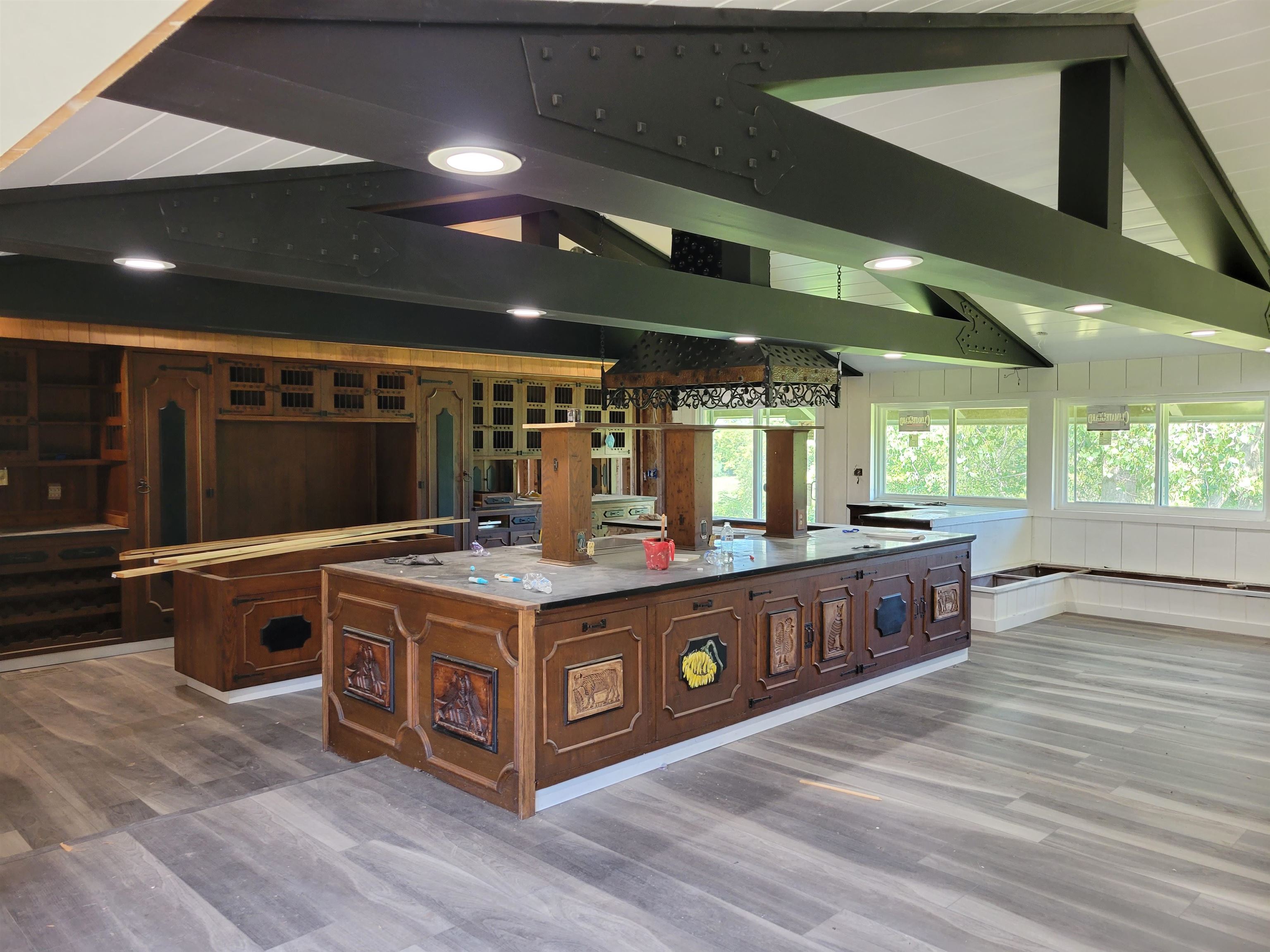 7037 Pomeroy Road Rockton, IL 61072 - Photo 19 of 35 a kitchen with stainless steel appliances granite countertop a stove and a wooden floor