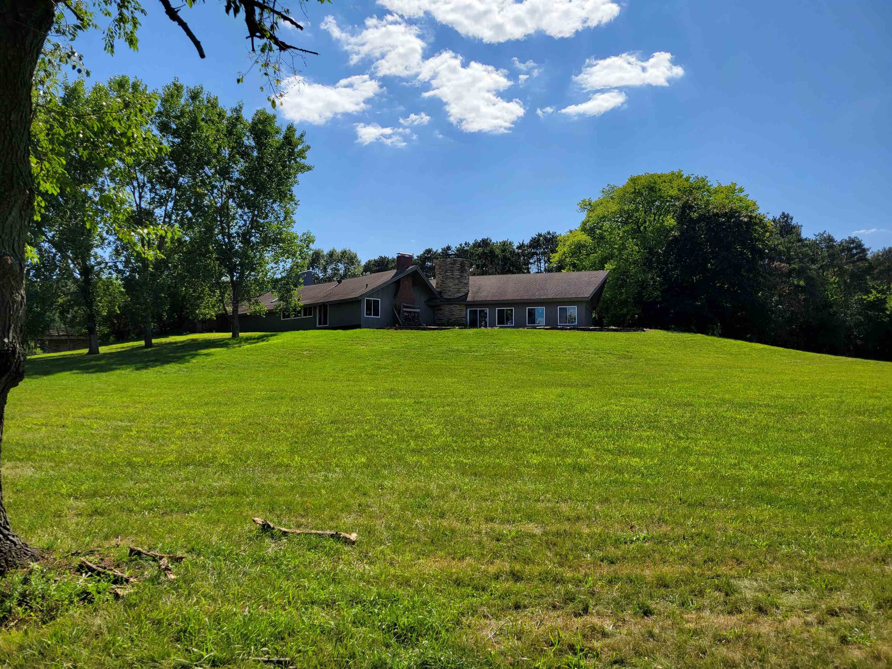 7037 Pomeroy Road Rockton, IL 61072 - Photo 31 of 35 a view of yard with swimming pool and green space