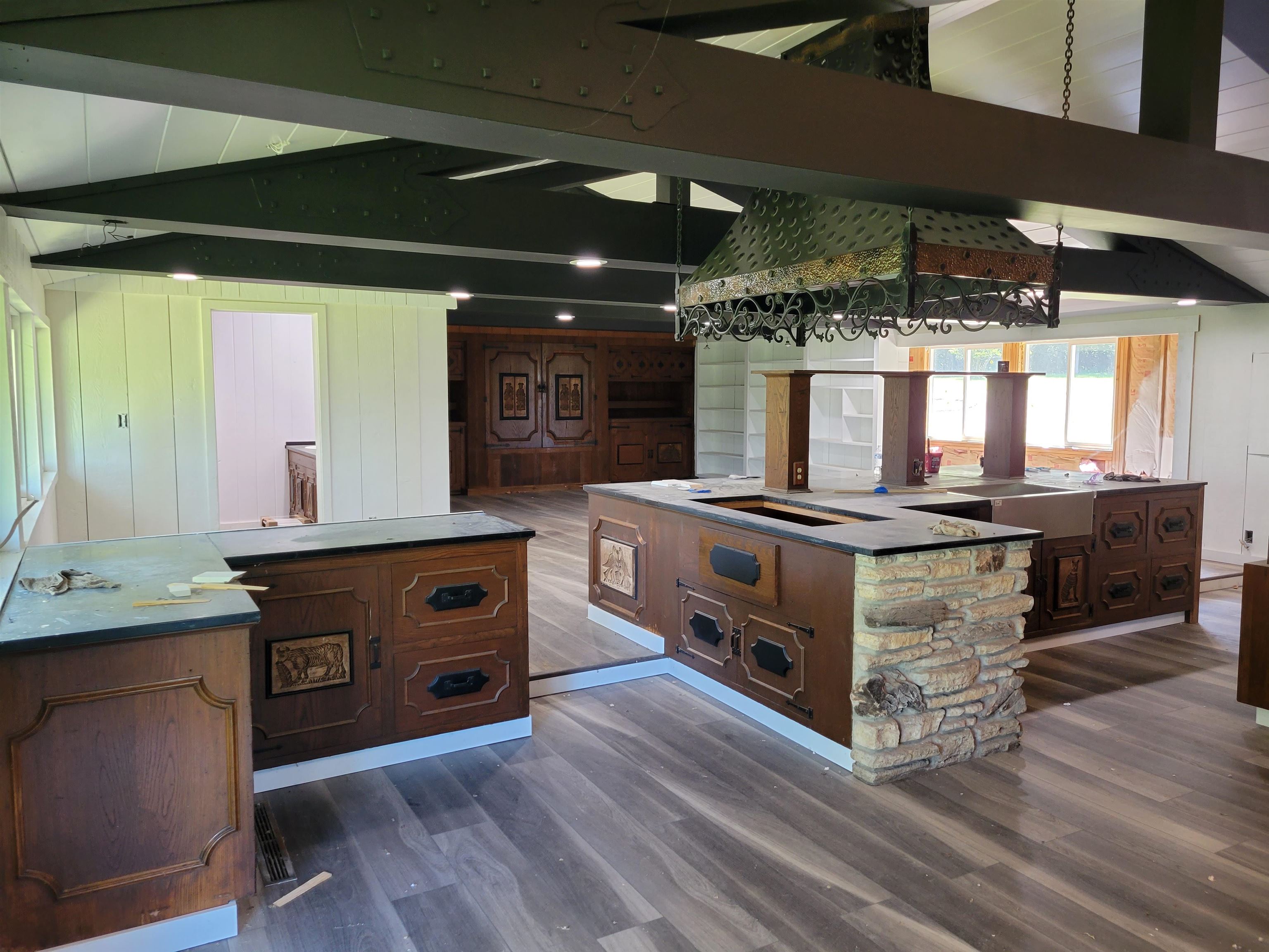 7037 Pomeroy Road Rockton, IL 61072 - Photo 10 of 35 a kitchen with stainless steel appliances granite countertop a stove a sink and a microwave