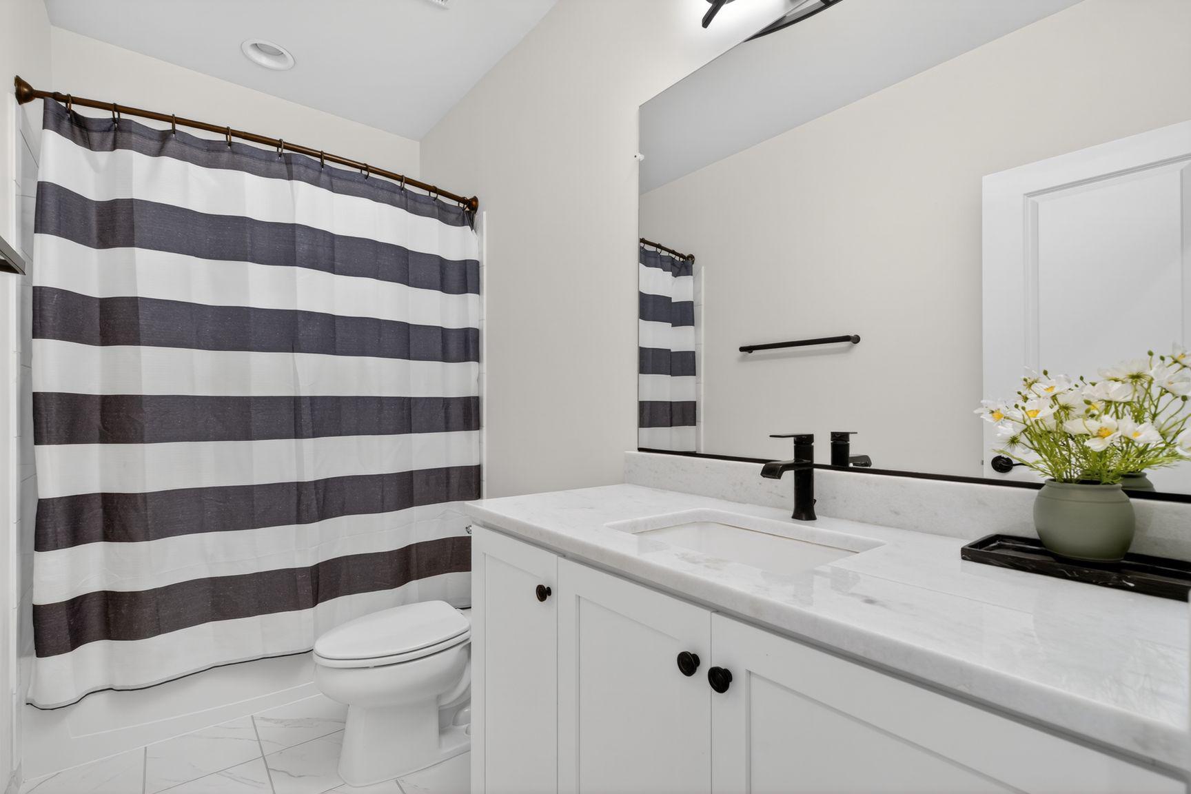 6213 Mcconnell Lane Springfield, VA 22152 - Photo 33 of 39 a bathroom with a sink toilet and shower