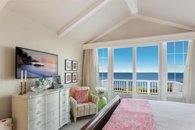 an aerial view of a residential houses with outdoor space