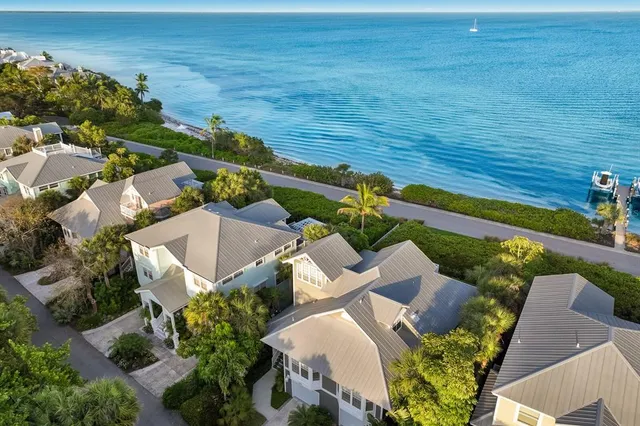 a view of a house with a flower garden