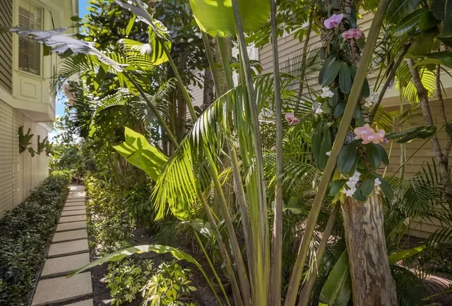 a view of a dining room with furniture and window