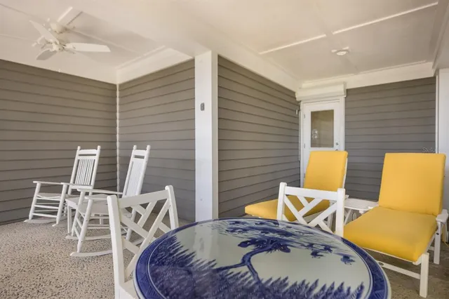 a view of a swimming pool and lounge chair