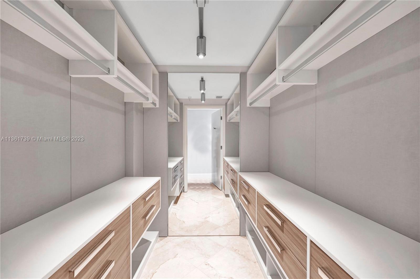 10 Venetian Way, Unit 603 Miami Beach, FL 33139 - Photo 13 of 30 a bathroom with a sink and a toilet