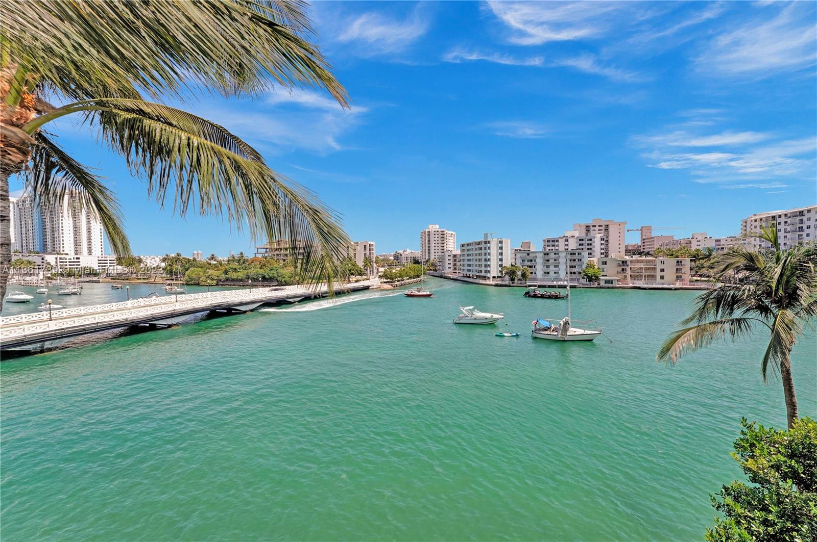 10 Venetian Way, Unit 603 Miami Beach, FL 33139 - Photo 27 of 30 a view of a house with a yard and potted plants