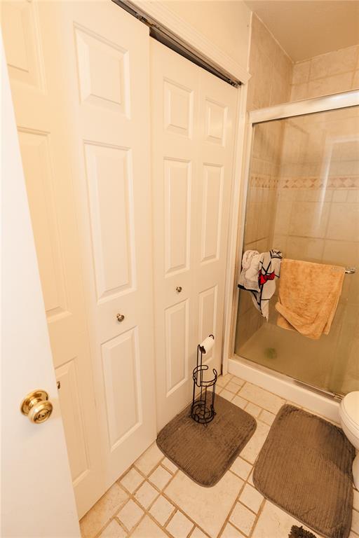 10819 Brickside Court Riverview, FL 33579 - Photo 15 of 22 a bathroom with a shower
