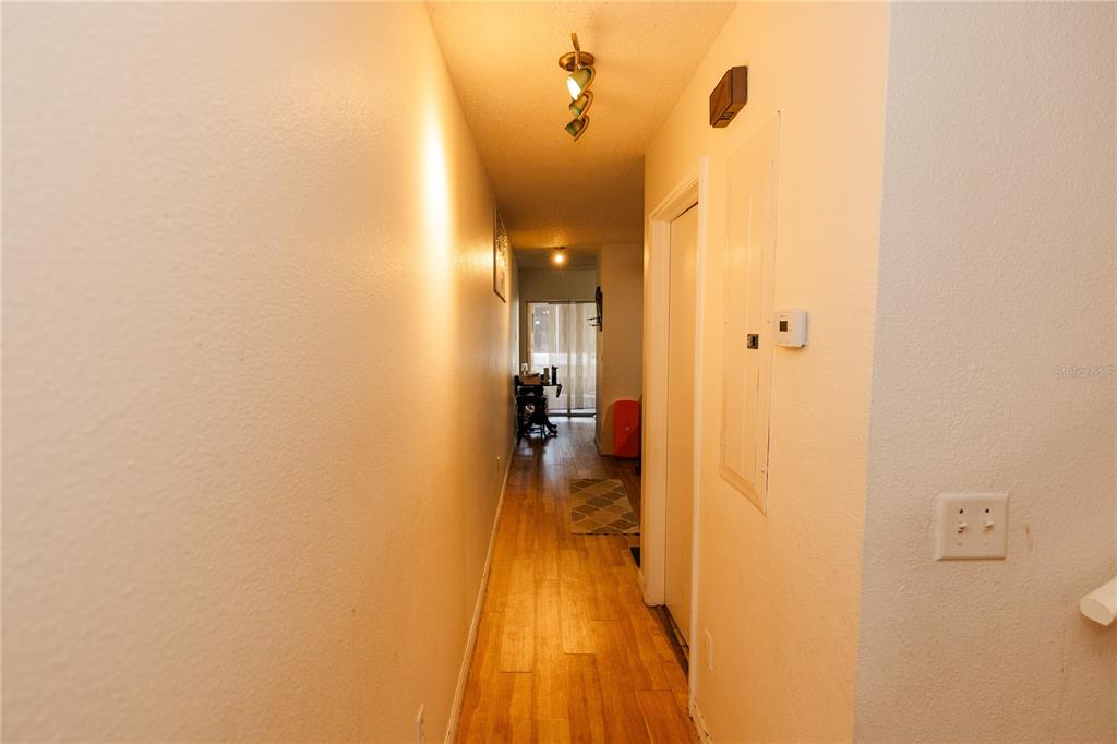 10819 Brickside Court Riverview, FL 33579 - Photo 7 of 22 a view of a bathroom from a hallway