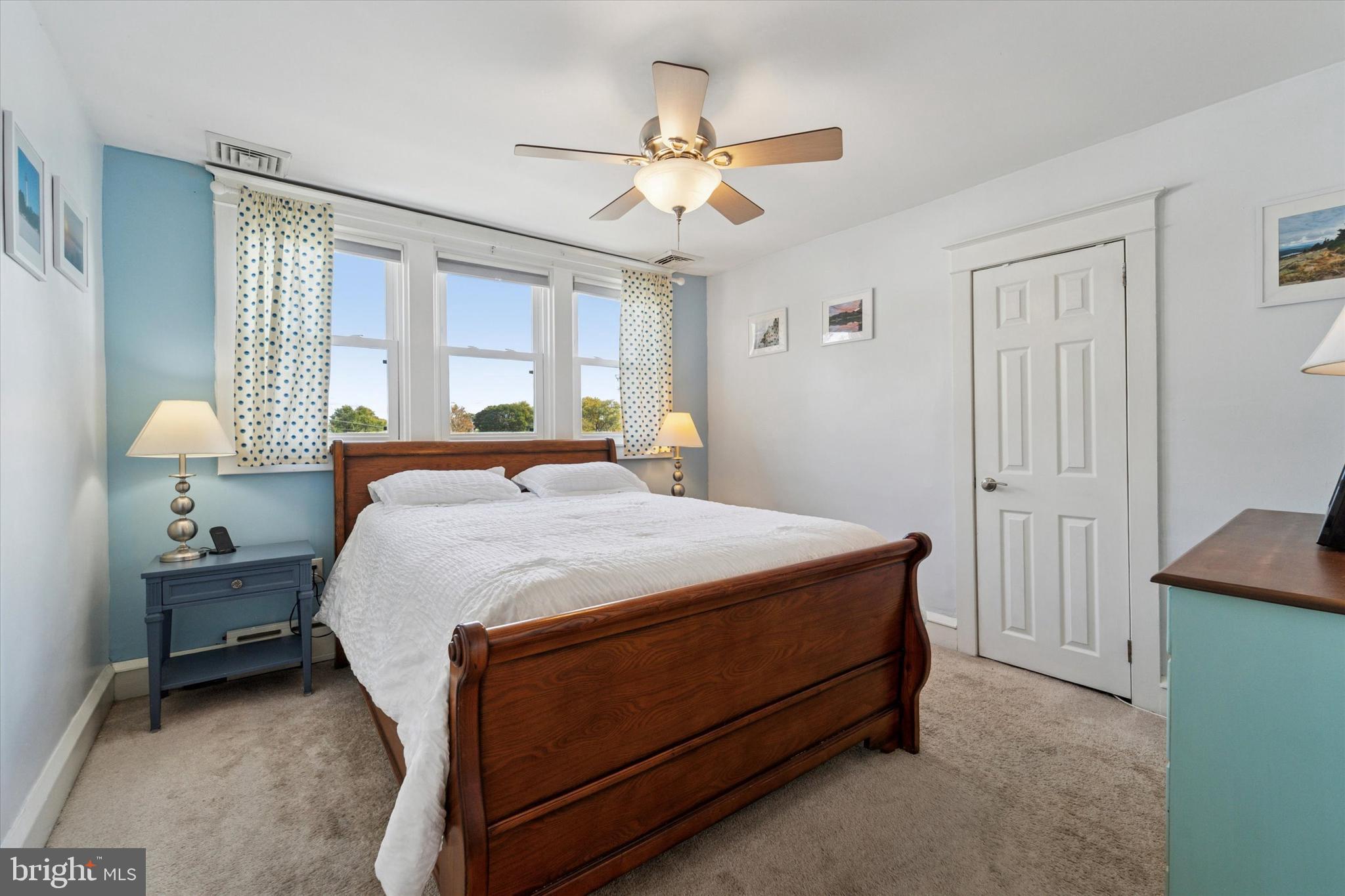 339 Sutton Avenue Folsom, PA 19033 - Photo 13 of 26 a bedroom with a bed and window
