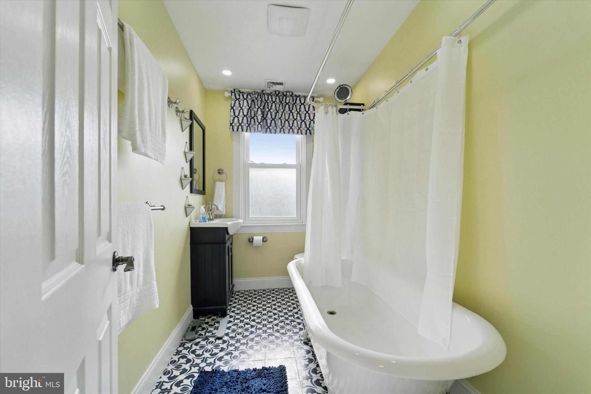 339 Sutton Avenue Folsom, PA 19033 - Photo 18 of 26 a bathroom with a sink and shower