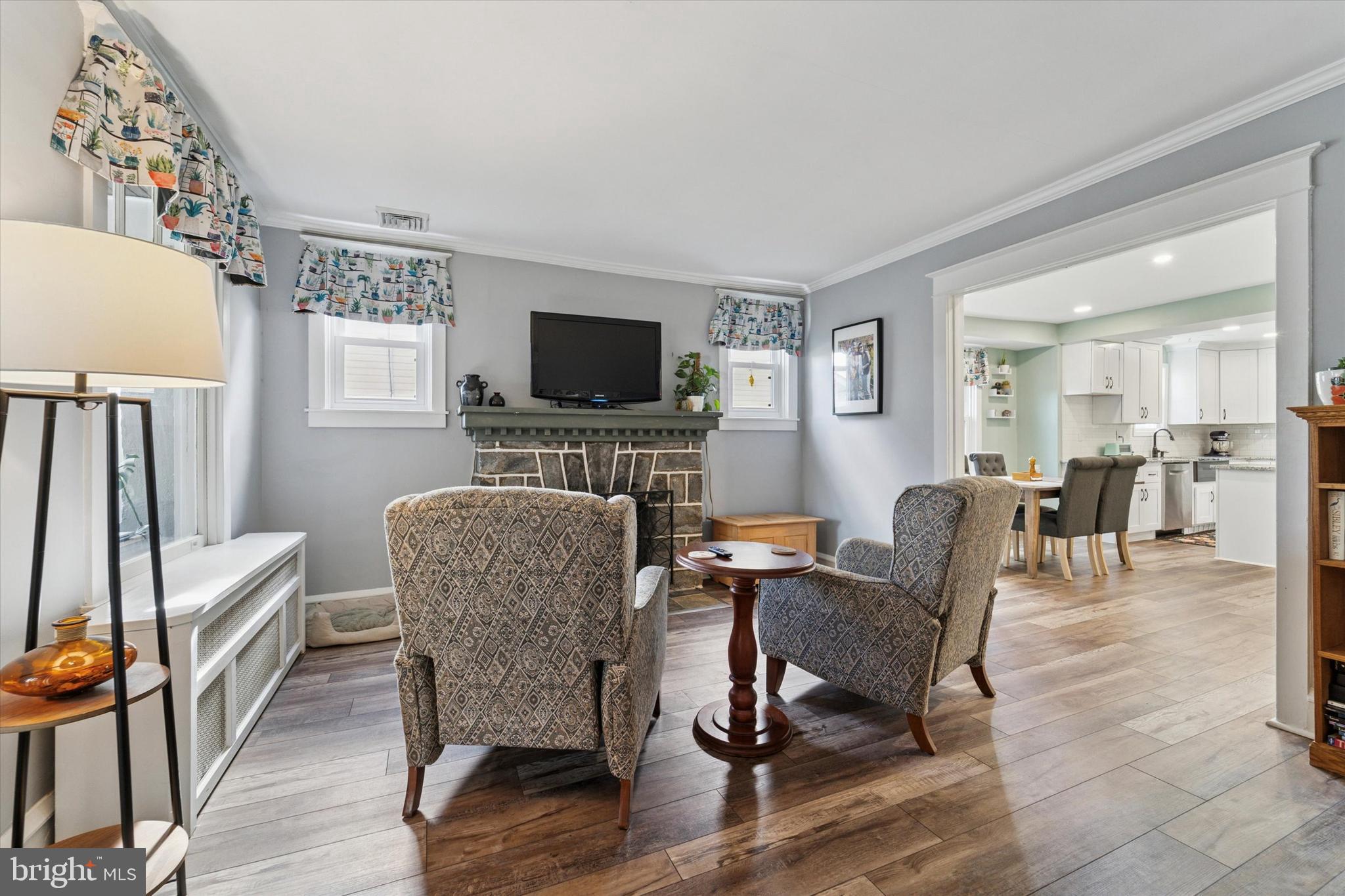 339 Sutton Avenue Folsom, PA 19033 - Photo 3 of 26 a living room with furniture and a flat screen tv