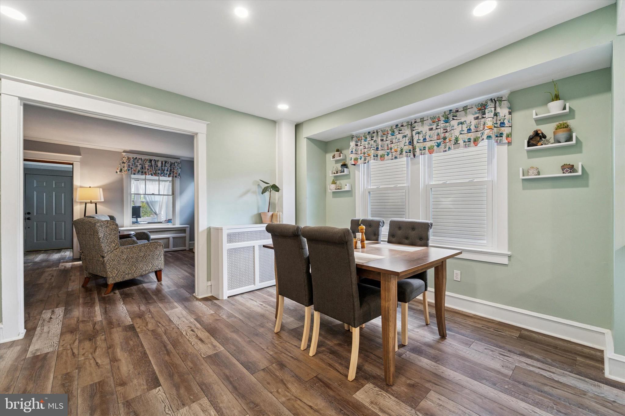 339 Sutton Avenue Folsom, PA 19033 - Photo 6 of 26 a view of a dining room with furniture window and wooden floor