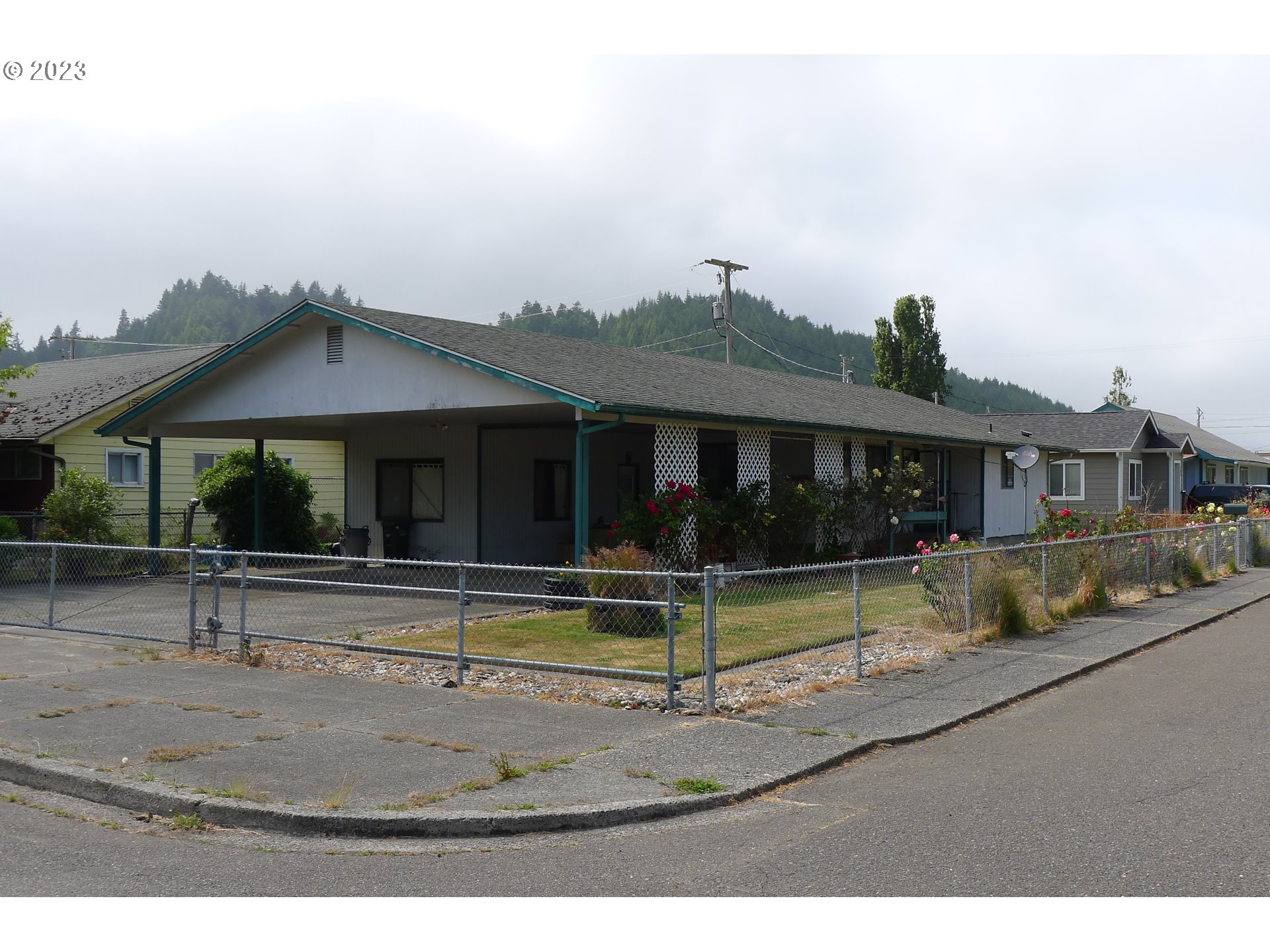 238 North 9th Street Reedsport, OR 97467 - Photo 5 of 38 a view of a house with swimming pool and sitting area