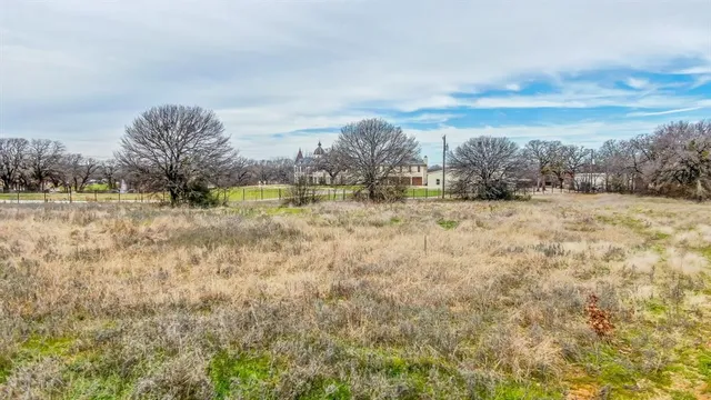 a view of a yard with an outdoor space