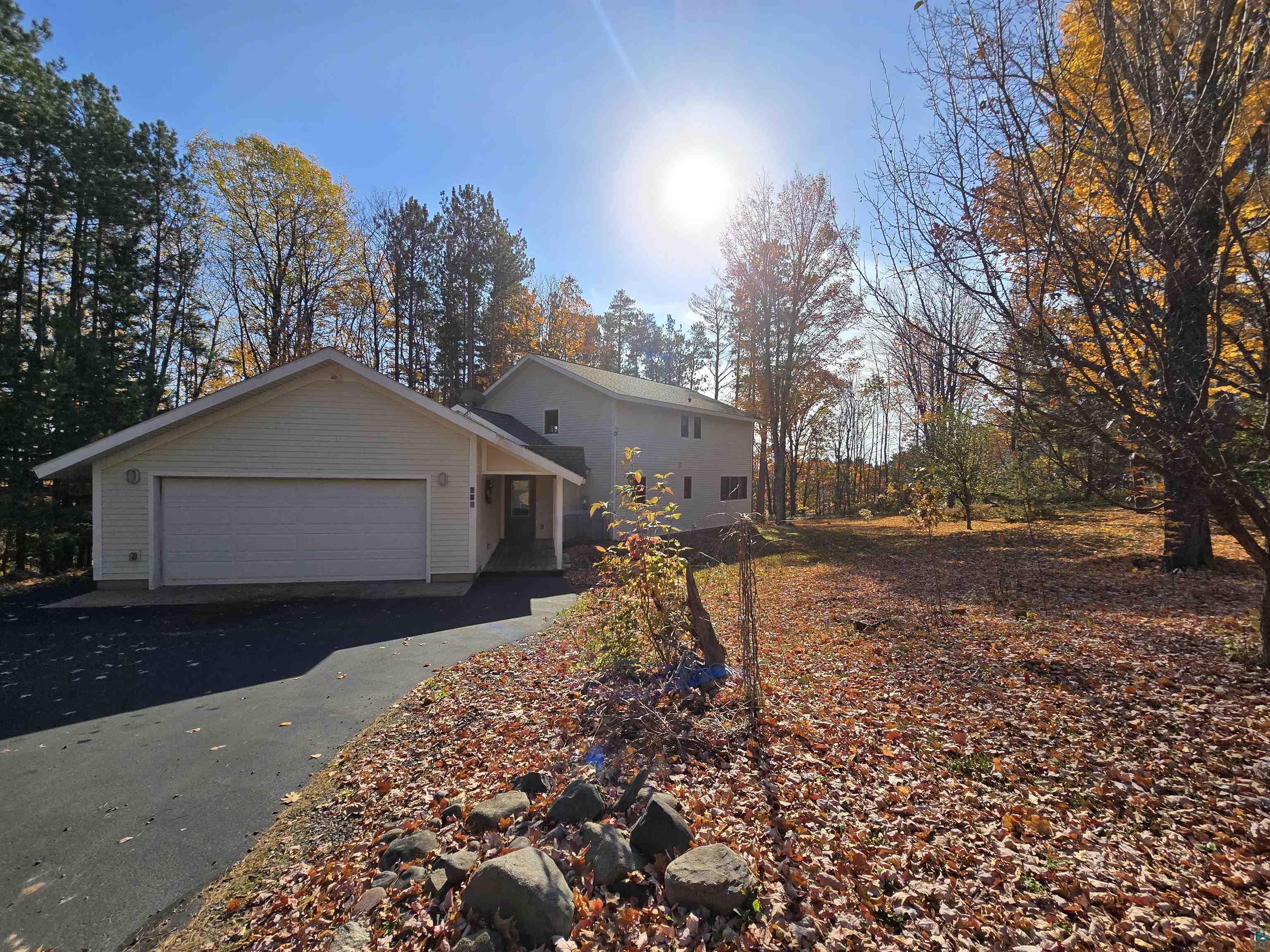 720 Rice Avenue Bayfield, WI 54814 - Photo 35 of 47 View of home's exterior with a garage