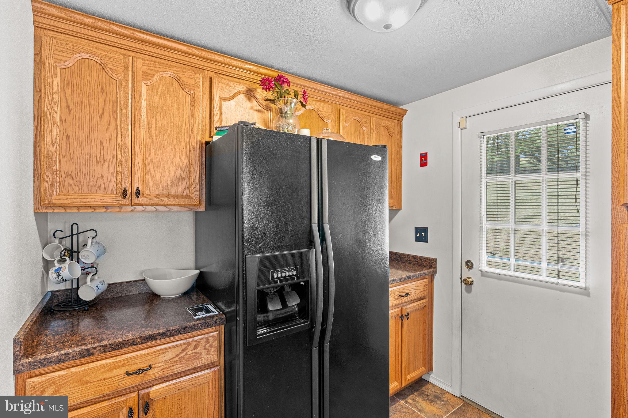 3212 Trinity Road Harrisburg, PA 17109 - Photo 10 of 23 a kitchen with stainless steel appliances granite countertop a refrigerator and a sink