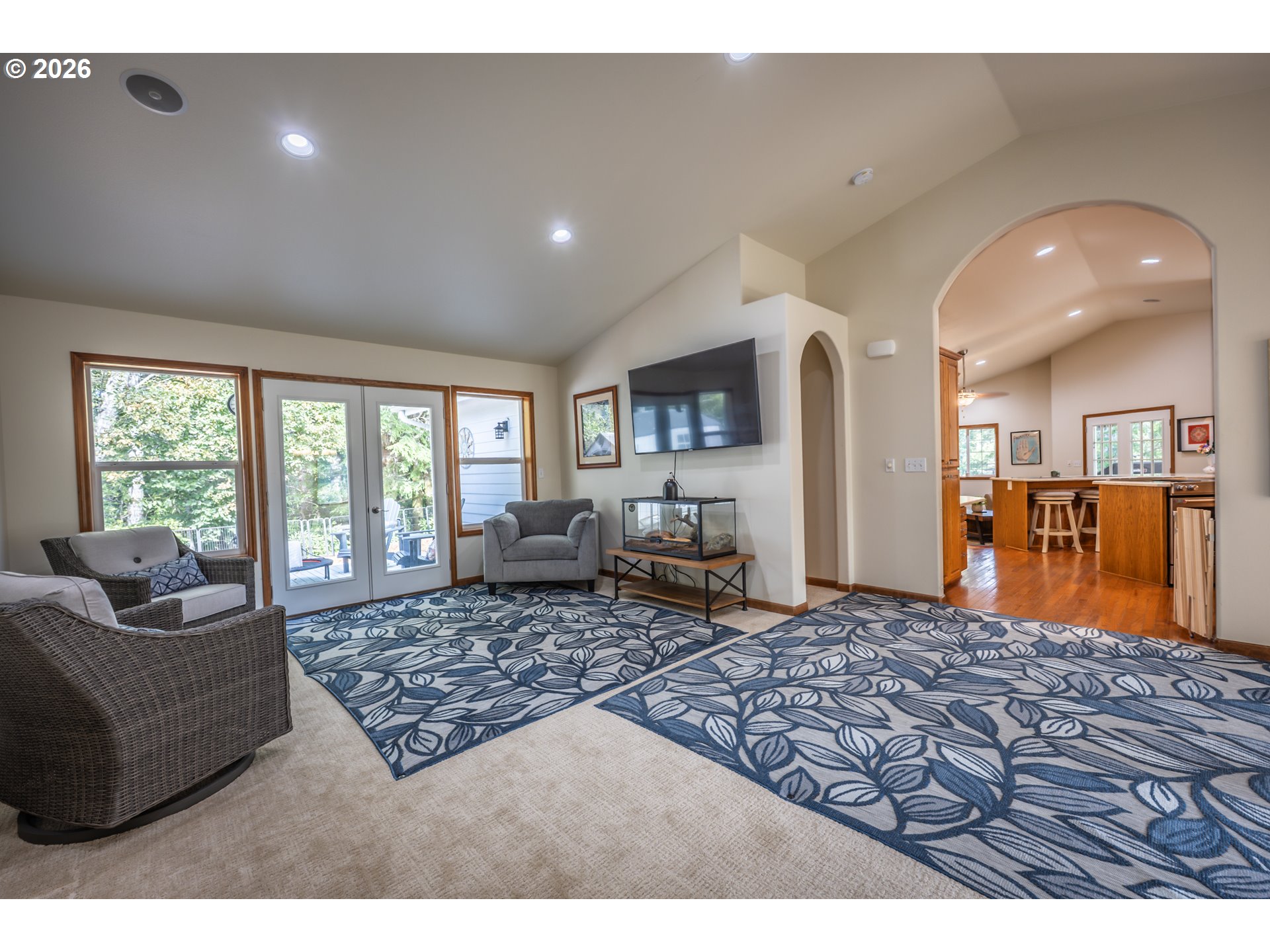 2193 13th Street Florence, OR 97439 - Photo 14 of 48 a living room with furniture rug and a table