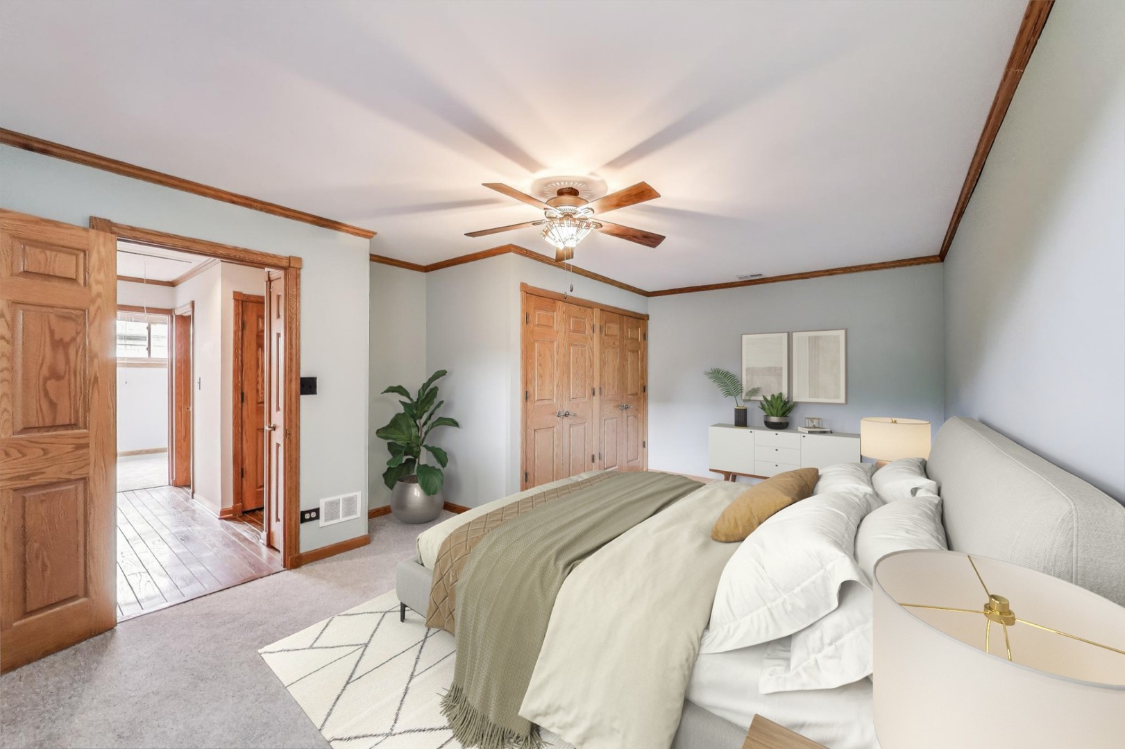 821 South Racine Avenue, Unit D Chicago, IL 60607 - Photo 12 of 20 a bedroom with a bed ceiling fan and a window