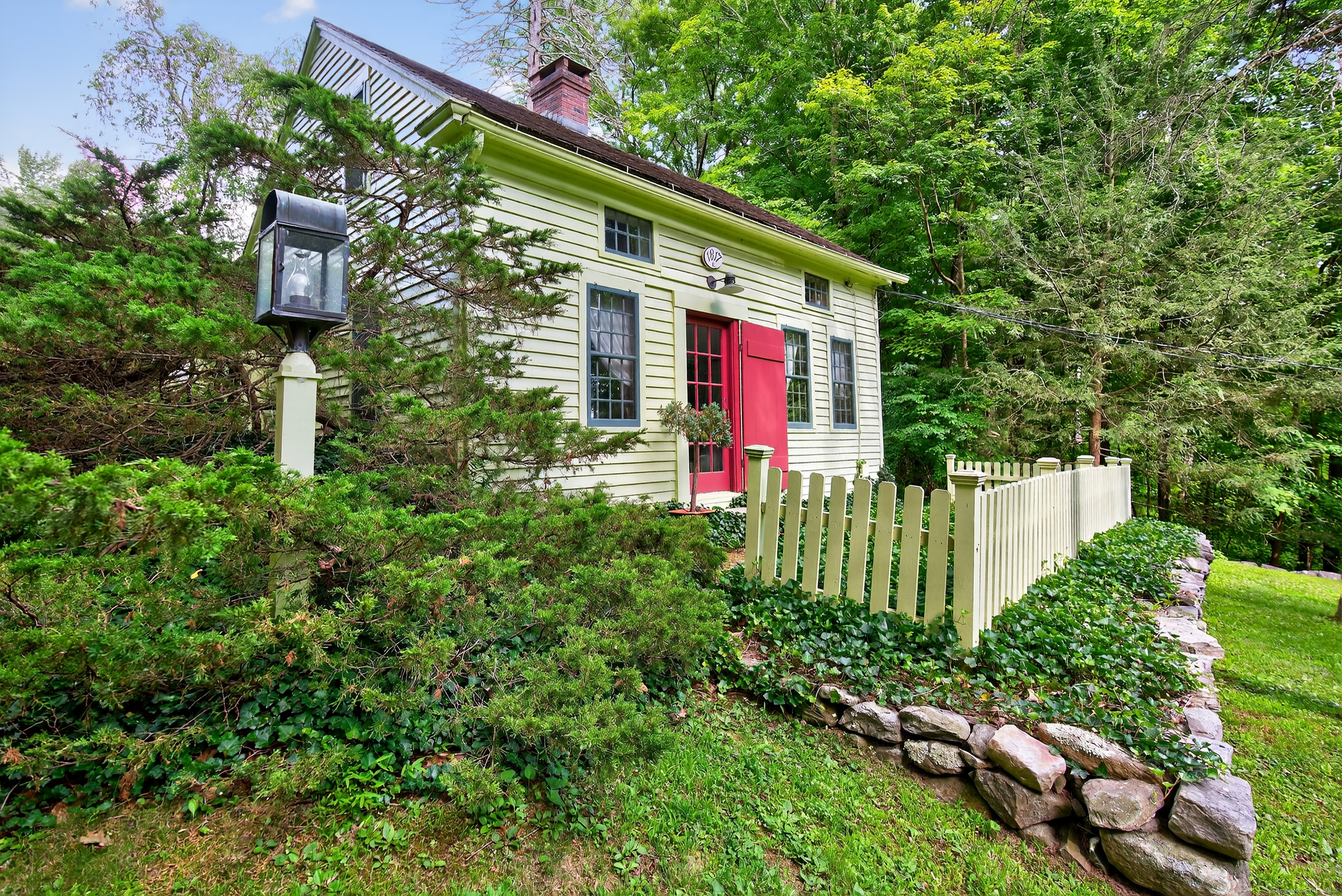 50 Southbury Road Roxbury, CT 06783 - Photo 31 of 31 a front view of a house with a yard