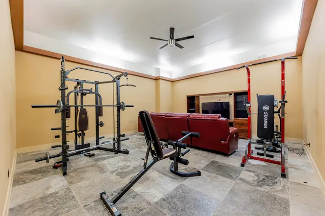 a swimming pool with outdoor seating